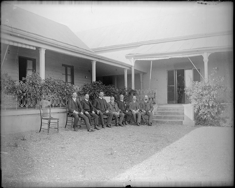 old men including James Robinson of Kimo Estate at a party