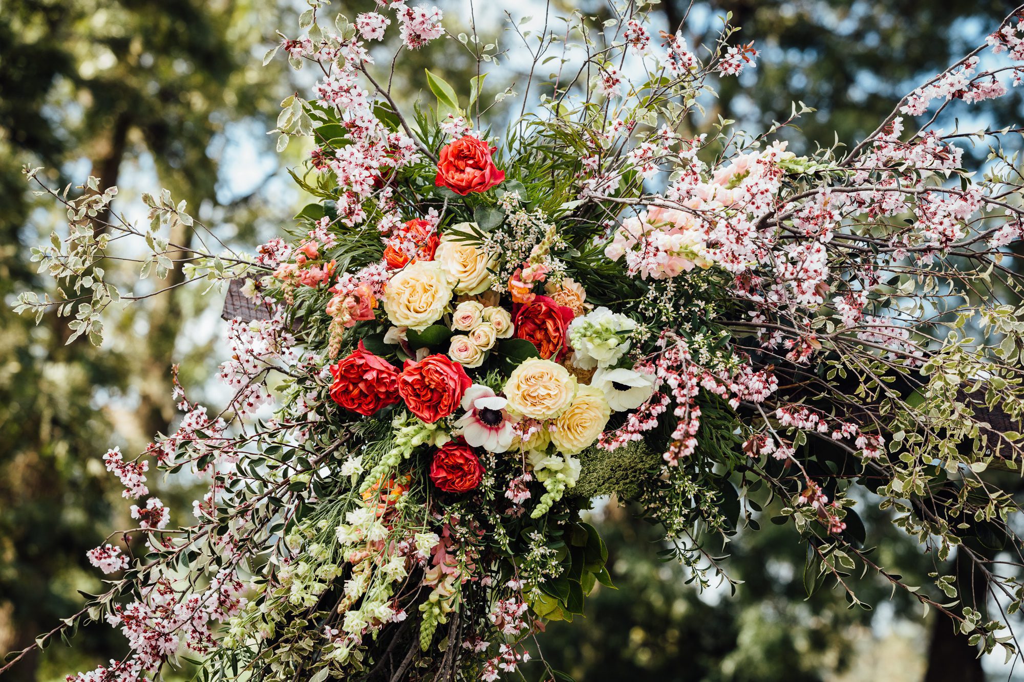 wedding floral arrangement on arbour at Kimo Estate wedding ceremony