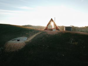 A-frame accommodation for guests from all over Australia sitting on a cliff face. Off-grid cabin open to the public.